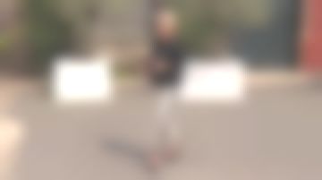 Los pantalones blancos rayas negras The Kooples de Sophie Davant en Deal concluyó el 25.02.2019