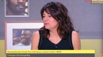 La tapa negra adornada con rayas de clavel calado Claudie Pierlot de Estelle Denis en L'Équipe d'Estelle el 26.02.2019