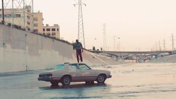 The Humble video: Kendrick Lamar standing on a 1982 Chevrolet Malibu