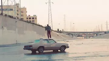 The Humble video: Kendrick Lamar standing on a 1982 Chevrolet Malibu