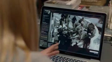 Apple MacBook Pro used by Kate Sumner (Rosamund Pike) in Johnny English Reborn