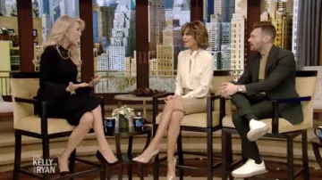 Burberry Vinyl midi skirt worn by Lisa Rinna on LIVE with Kelly and Ryan March 26, 2019