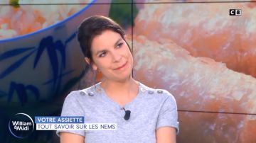 Le pull gris de Raphaele Marchal dans William à midi du 11/03/2019