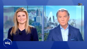 Le pull marine de Sandrine Arcizet dans William à midi du 26/03/2019