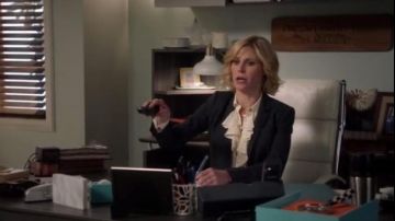 J.Crew Tuxedo ruffle top in polka-dot silk worn by Claire Dunphy (Julie Bowen) in Modern Family (S08E16)