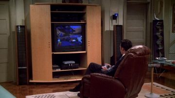 Sony Playstation used by Chandler Bing (Matthew Perry) in Friends (S07E01)