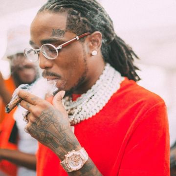Camiseta naranja de Quavo en la cuenta de Instagram del @Migos
