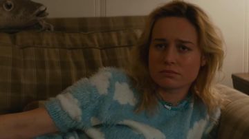 Sweater blue sky with clouds carried by Kit (Brie Larson) in Unicorn Store