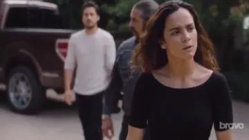 Helmut Lang Off-the-Shoulder Short-Sleeve Ribbed Silk Top worn by Teresa Mendoza (Alice Braga) in Queen of the South (S03E13)