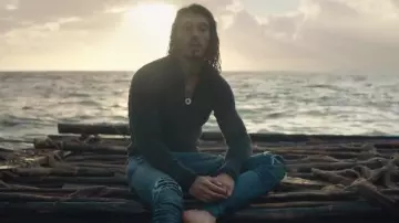 The john ripped worn-by-N. O. S in the clip Has the Ammonia of NLP
