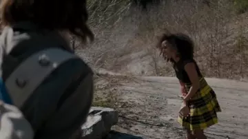 The plaid skirt-yellow and black worn by Lizzie (Logan Browning) in The Perfection