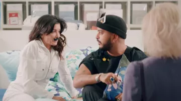 La combinaison blanche portée par Jenifer dans son clip Les choses simples avec Slimane