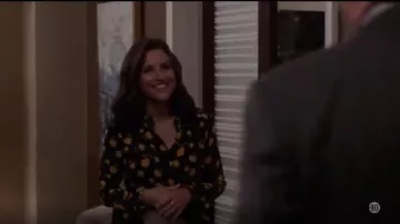 Michael Kors Scattered Roses Silk Flare-Sleeve Blouse worn by Selina Meyer (Julia Louis-Dreyfus) in Veep (S07E04)
