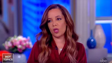 Zimmermann Ruffled silk-satin wrap dress worn by Sunny Hostin on Buying the View March 15, 2019