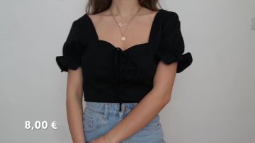 Le top noué noir de Only Carla Ma­keup dans sa vi­déo You­Tube BIG HAUL PRINTEMPS 2019