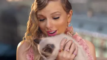 The earrings in crystal rose Rebecca de Ravenel of Taylor Swift in her video clip to ME! (feat. Brendon Urie of Panic! At The Disco)