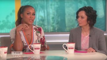 Sandro Floral Print Silk Wrap Dress worn by Eve Torres on The Talk May 8, 2019