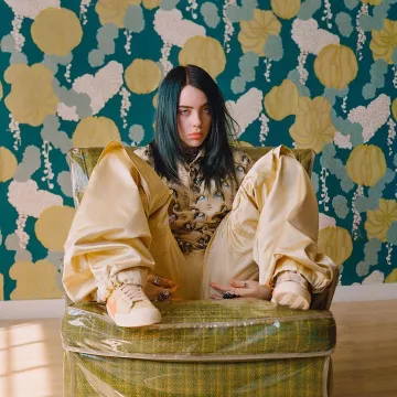 Raf Simons Yellow Satin Slim-Leg Trousers worn by Billie Eilish on the Instagram account of @billboard
