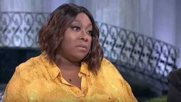 Asos Curve animal jacquard mono usado por Loni Love en The Real Talk Show 24 de abril de 2019