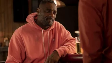 Pink Champion Hoodie worn by Charlie Ayo (Idris Elba) as seen in Turn Up Charlie S01E03