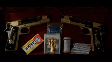 Le paquet de chewing-gum "Chiclets" de Castor Troy (Nicolas Cage) dans Volte/Face