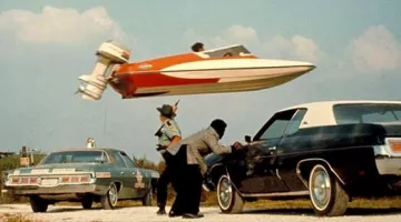 The boat Glastron GT-150 by Roger Moore in Live and let die