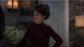 Suéter Corina de Acne Studios usado por Karen Walker (Megan Mullally) en Will & Grace (S01E02)