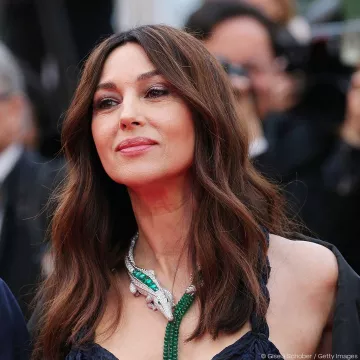 The padded crocodile silver green worn by Monica Bellucci on May 18, 2019 on the red carpet at the red carpet of the Cannes film Festival