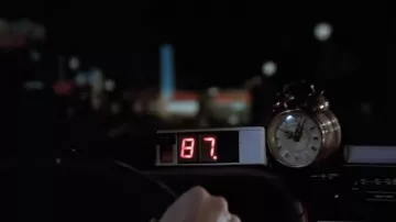 The replica of the wake up golden brown in the Delorean to Marty and Doc in Back to the future 1