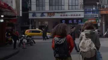 The down jacket, thin long sleeve orange Lizzie (Logan Browning) in The Perfection