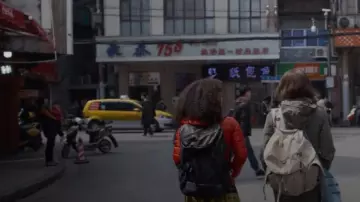 The down jacket, thin long sleeve orange Lizzie (Logan Browning) in The Perfection