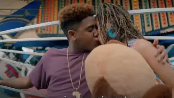 The necklace pendant gold shape Africa worn by Korey Wise (Jharrel Jerome) in their eyes (Season 1))