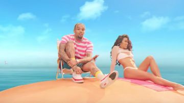 Pink and white striped t shirt worn by Chris Brown in his official music video Wobble Up ft. Nicki Minaj, G-Eazy