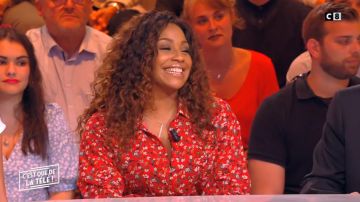 The Dress skater red floral print and ruffles of Ludivine Rétory in It is that of the tv !