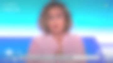 Blusa Lauren de seda a rayas de manga larga de Caroline Roux con cuello mao en C dans l'air el 30.05.2019