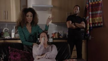 Asos wrap top with asymmetric button detail in spot print with long sleeves worn by Chantelle Atkins (Jessica Plummer) in EastEnders May 30, 2019