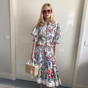 The handbag, linen basket and wicker with leather finish white worn by Elle Fanning on the account instagram of @whowhatwear.uk in May 2019