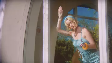 The trouser suit medium to thin straps color faded jeans worn by Katy Perry in her video clip Never Really Over