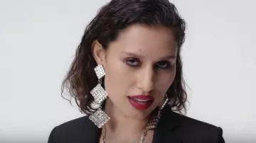 The pair of earrings 3 diamond rhinestone silver worn by Raye in the movie clip Stay (dont Go Away) by David Guetta