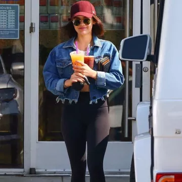 Ray-Ban Round Sunglasses worn by Lucy Hale in front of The Coffee Bean June 3, 2019