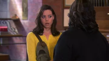 Yellow Pointelle Cable Cardigan in Gold worn by April Ludgate (Aubrey Plaza) in Parks and Recreation (Season07 Episode07)
