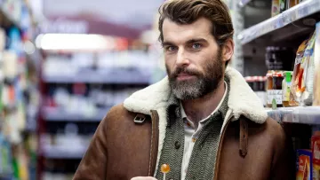 The brown leather jacket lapel sheep range by bullet Hole (Stanley Weber) in Fly (S01)