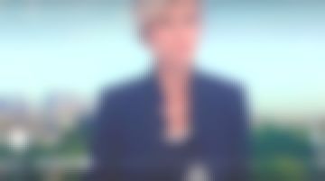 The jacket without buttons, collar, rhinestone 'I LOVE YOU' on the sleeve of Estelle Colin in Télématin