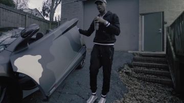 Pantalones de pista negros usados por Key Glock como se ve en su video musical Spazzin Out