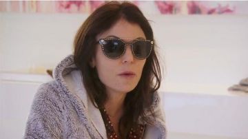 Versace Studded Flat-Top Wrap Sunglasses worn by Bethenny Frankel in The Real Housewives of New York City (S11E15)
