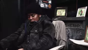 Black beanie worn by YBN Cordae as seen in his  Bad Idea music video feat. Chance The Rapper