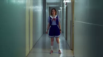 Converse Chuck Taylor All Star Low Top Sneakers in Red worn by Robin (Maya Hawke) in Stranger Things (Season 3)