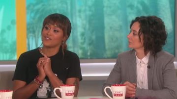 Urban Outfitters Biggie and Puffy Photo Tee worn by Eve on The Talk June 18,2019