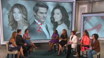 Alice + Olivia Duke Raglan-Sleeve Cropped Reversible Bomber Jacket worn by Eve on  The Talk June 24,2019