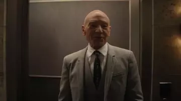 Grey 3 pieces suit blazer worn by Bosley (Patrick Stewart) in Charlie's Angels